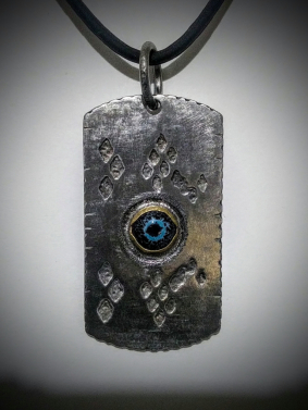 Eye of the Serpent - Stainless steel, enamel, brass, titanium bail